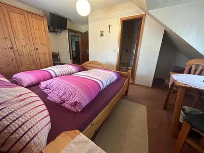 Ein Bett oder Betten in einem Zimmer der Unterkunft Gasthaus Zur Krone