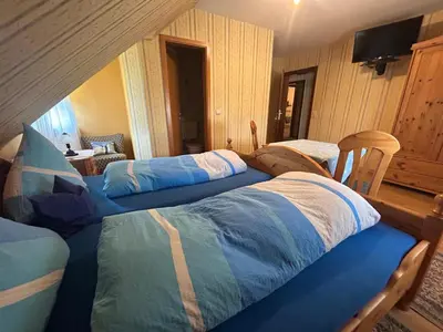 Ein Bett oder Betten in einem Zimmer der Unterkunft Gasthaus Zur Krone