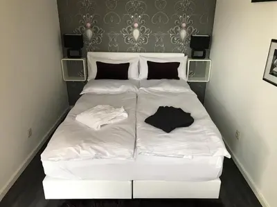 Ein Bett oder Betten in einem Zimmer der Unterkunft Haus Silvia