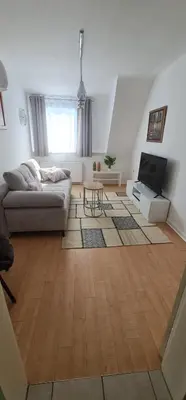 Ein Sitzbereich in der Unterkunft Zum Brückentor