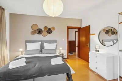 Ein Bett oder Betten in einem Zimmer der Unterkunft DD Homes - Haus im Grünen - 7 Betten,3 SZ,Terrasse,110 qm