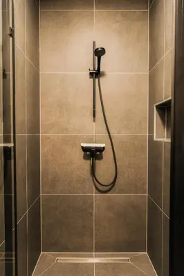 Ein Badezimmer in der Unterkunft Moderne 3-Schlafzimmer-Apartments mit Balkon & Aufzug bis 6 Personen