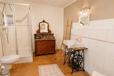 Ein Badezimmer in der Unterkunft Eulenhaus