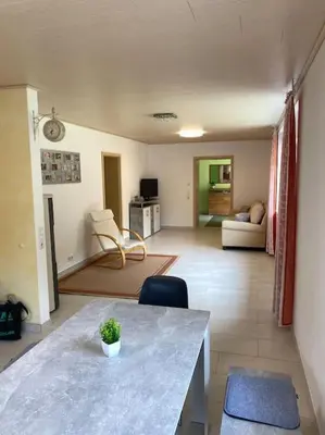 Ein Sitzbereich in der Unterkunft Ferienwohnung Bangert