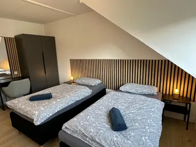 Ein Bett oder Betten in einem Zimmer der Unterkunft Kirchberg Apartments