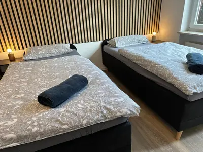 Ein Bett oder Betten in einem Zimmer der Unterkunft Kirchberg Apartments