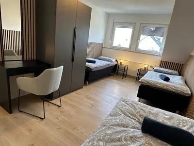 Ein Bett oder Betten in einem Zimmer der Unterkunft Kirchberg Apartments
