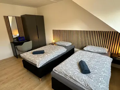 Ein Bett oder Betten in einem Zimmer der Unterkunft Kirchberg Apartments