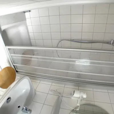 Ein Badezimmer in der Unterkunft Cafe Klering