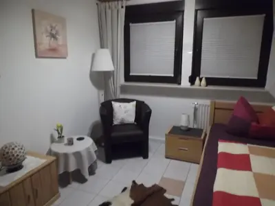 Ein Bett oder Betten in einem Zimmer der Unterkunft Ferienwohnung Schmitz