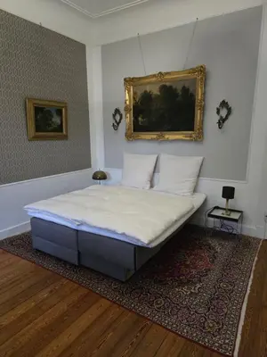 Ein Bett oder Betten in einem Zimmer der Unterkunft Villa Valerius