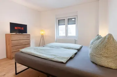 Ein Bett oder Betten in einem Zimmer der Unterkunft Vulkaneifel Cottage