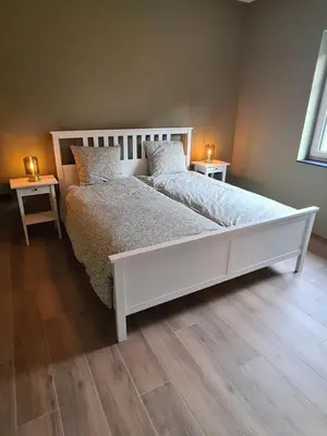 Ein Bett oder Betten in einem Zimmer der Unterkunft Ferienhaus am Berg