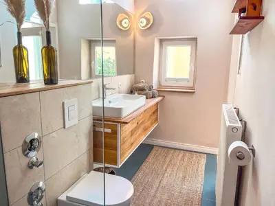 Ein Badezimmer in der Unterkunft Minimalus Koblenz Apartment I mit Whirlpool