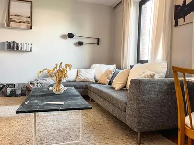 Ein Sitzbereich in der Unterkunft Minimalus Koblenz Apartment I mit Whirlpool