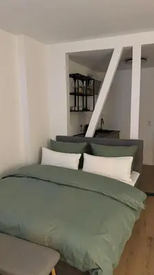 Ein Bett oder Betten in einem Zimmer der Unterkunft Gemütliches Design Appartment