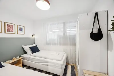 Ein Bett oder Betten in einem Zimmer der Unterkunft Helle & moderne Wohnung mit Panorama-Balkon