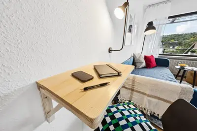 Ein Sitzbereich in der Unterkunft Helle & moderne Wohnung mit Panorama-Balkon
