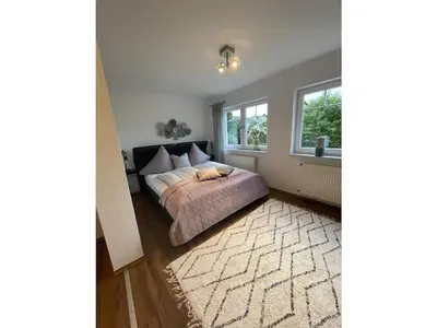 Ein Bett oder Betten in einem Zimmer der Unterkunft Moselschön 3 with terrace and garden