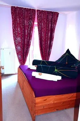 Ein Bett oder Betten in einem Zimmer der Unterkunft Holiday Rhein3