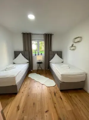 Ein Bett oder Betten in einem Zimmer der Unterkunft Panorama-Paradies im Rheintal