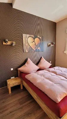 Ein Bett oder Betten in einem Zimmer der Unterkunft Moselanker de in Enkirch Mosel