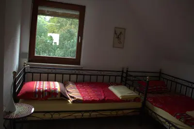 Ein Bett oder Betten in einem Zimmer der Unterkunft Altlayer Höhenblick
