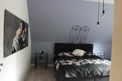 Ein Bett oder Betten in einem Zimmer der Unterkunft Altlayer Höhenblick