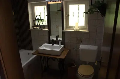 Ein Badezimmer in der Unterkunft Altlayer Höhenblick