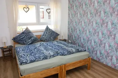 Ein Bett oder Betten in einem Zimmer der Unterkunft Ländliches Apartment Sonnenblume