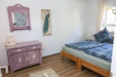Ein Bett oder Betten in einem Zimmer der Unterkunft Ländliches Apartment Sonnenblume