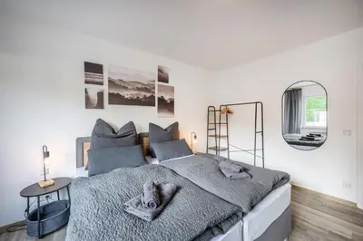 Ein Bett oder Betten in einem Zimmer der Unterkunft Untere Rheinblick-Oase Komfort mit 2 SZ Balkon