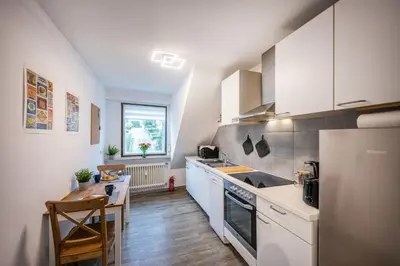 Küche/Küchenzeile in der Unterkunft Obere Rheinblick-Oase Komfort mit 2 SZ Balkon
