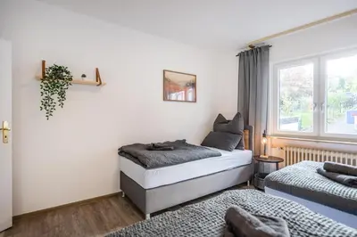 Ein Bett oder Betten in einem Zimmer der Unterkunft Rhein-View-Oase für große Gruppen - Parkplätze