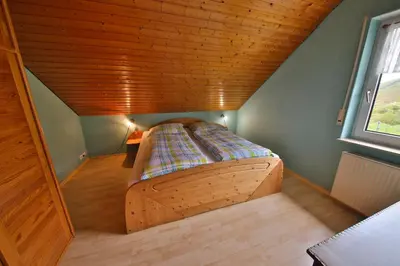 Ein Bett oder Betten in einem Zimmer der Unterkunft Fewo Bleser