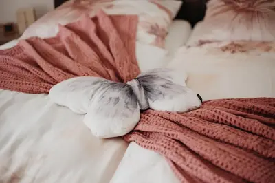 Ein Bett oder Betten in einem Zimmer der Unterkunft Ferienwohnungen Kornkammer und Kirschstübchen