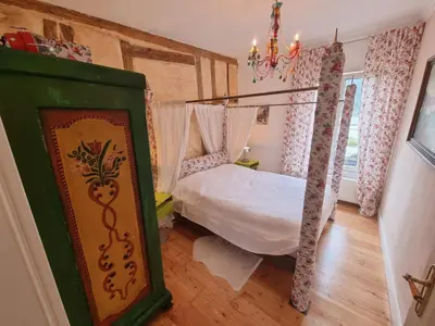 Ein Bett oder Betten in einem Zimmer der Unterkunft Eismauer Suite