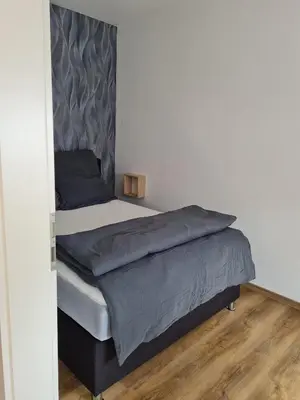 Ein Bett oder Betten in einem Zimmer der Unterkunft Ferienhaus Alex