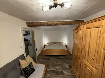 Ein Bett oder Betten in einem Zimmer der Unterkunft Ferienwohnung Streamatze auf Whiskey's Farm