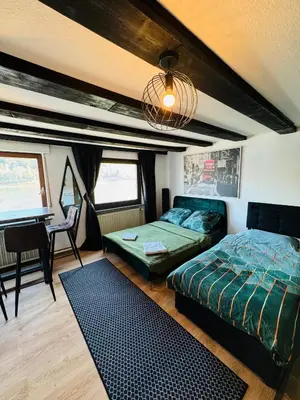 Ein Bett oder Betten in einem Zimmer der Unterkunft Loft Fluss Blick