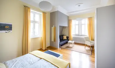 Ein Bett oder Betten in einem Zimmer der Unterkunft Gästehaus & Weingut Clüsserath-Weiler