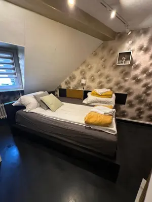 Ein Bett oder Betten in einem Zimmer der Unterkunft Max & Moritz 3 Koblenz
