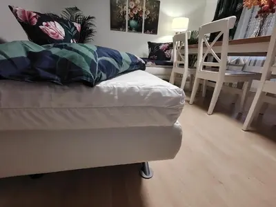 Ein Bett oder Betten in einem Zimmer der Unterkunft Rhein Ferienwohnung 3-Zimmer Garten Free Parking Netflix Premium Disney Premium