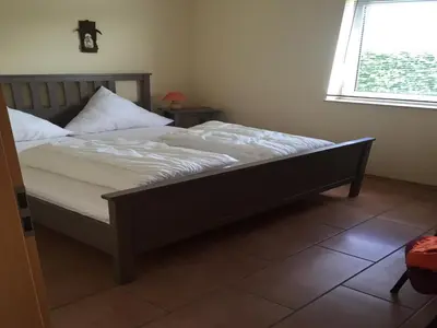 Ein Bett oder Betten in einem Zimmer der Unterkunft Bungalow in Eifel near Mountain Trails