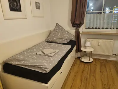 Ein Bett oder Betten in einem Zimmer der Unterkunft Schöne Ferienwohnung in Koblenz HG2