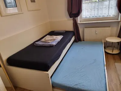 Ein Bett oder Betten in einem Zimmer der Unterkunft Schöne Ferienwohnung in Koblenz HG2