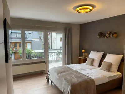 Ein Bett oder Betten in einem Zimmer der Unterkunft Ferienhaus Mosel-Wohnen l