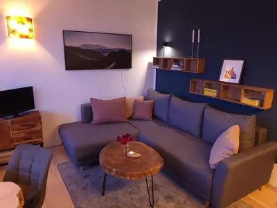 Ein Sitzbereich in der Unterkunft Sauna, Terrasse, Fernblick & Design - modern-gemütliche FeWo am Aremberg