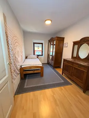 Ein Bett oder Betten in einem Zimmer der Unterkunft Großzügiges Haus in Moselnähe