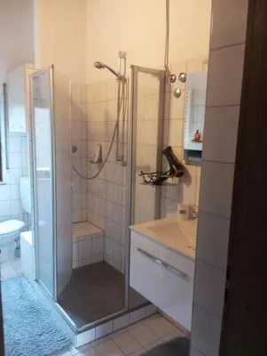 Ein Badezimmer in der Unterkunft GOLF-Lodge